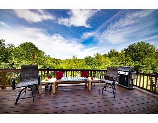 437 Ashby Road Ashburnham, MA 01430 - Photo 27 of 30 a view of a chairs and table on the wooden floor