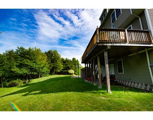 437 Ashby Road Ashburnham, MA 01430 - Photo 29 of 30 a view of a house with a yard