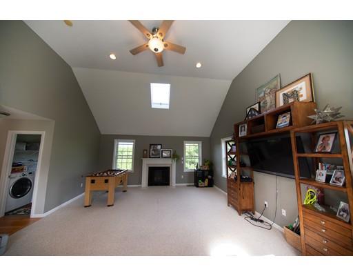 437 Ashby Road Ashburnham, MA 01430 - Photo 9 of 30 a living room with furniture and a flat screen tv