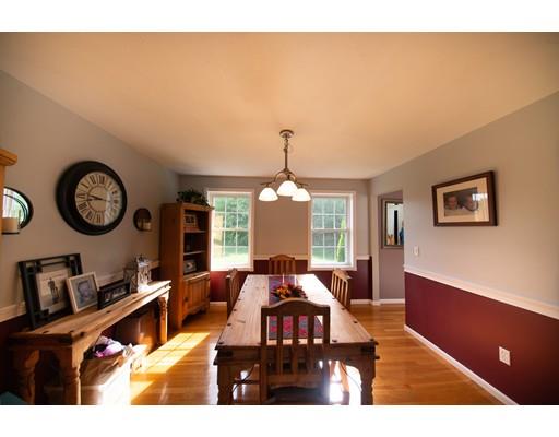 437 Ashby Road Ashburnham, MA 01430 - Photo 10 of 30 a living room with furniture and a chandelier