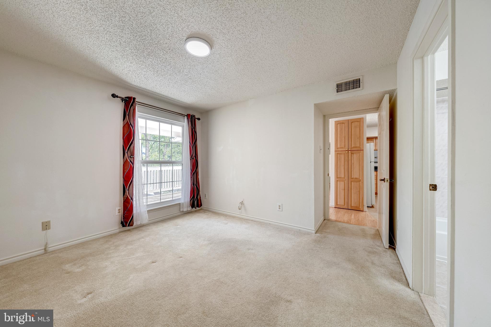 1539 Lincoln Way, Unit 302B McLean, VA 22102 - Photo 20 of 53 a view of an empty room with a window