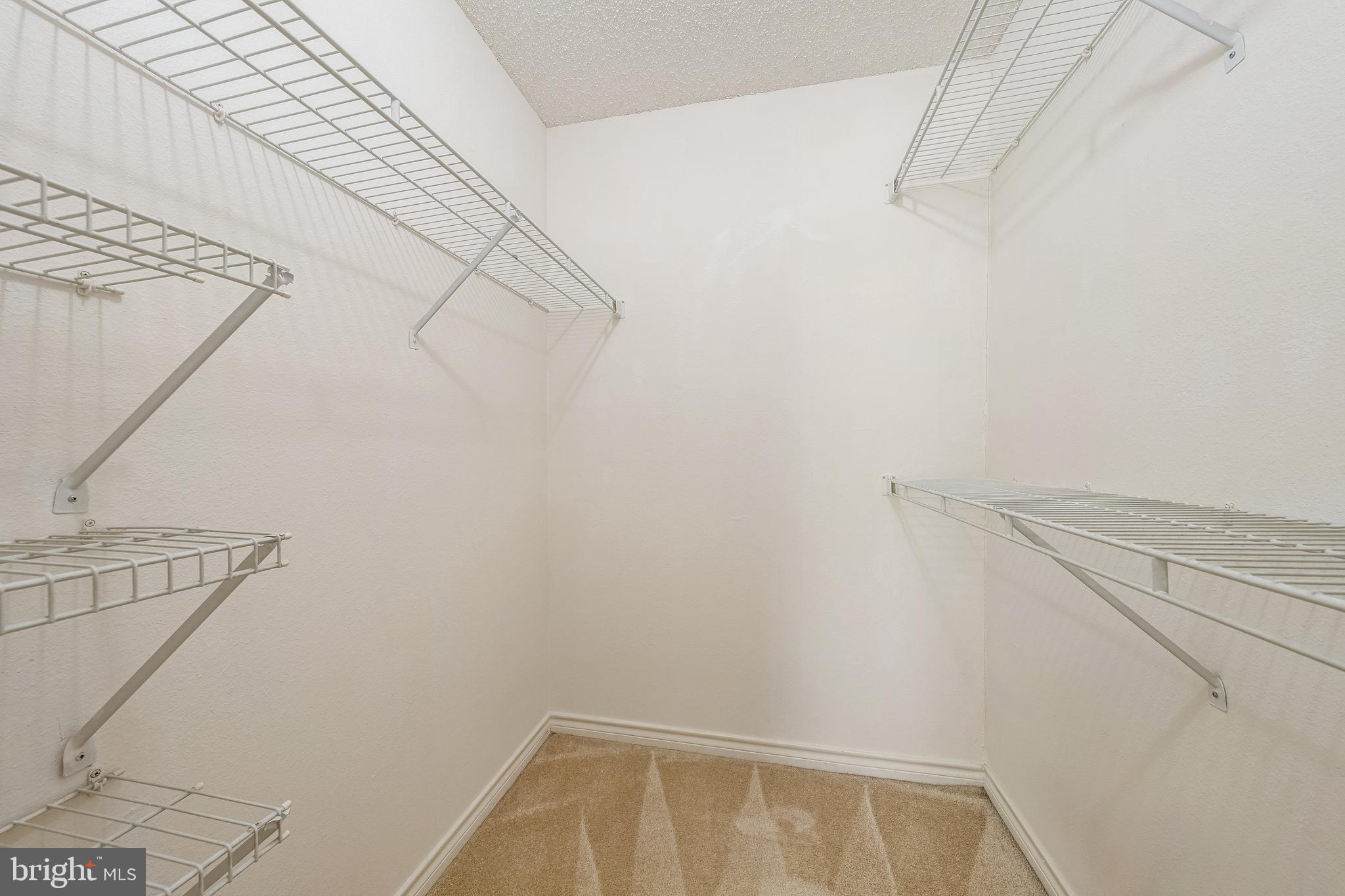 1539 Lincoln Way, Unit 302B McLean, VA 22102 - Photo 22 of 53 a view of small space with racks on the wall