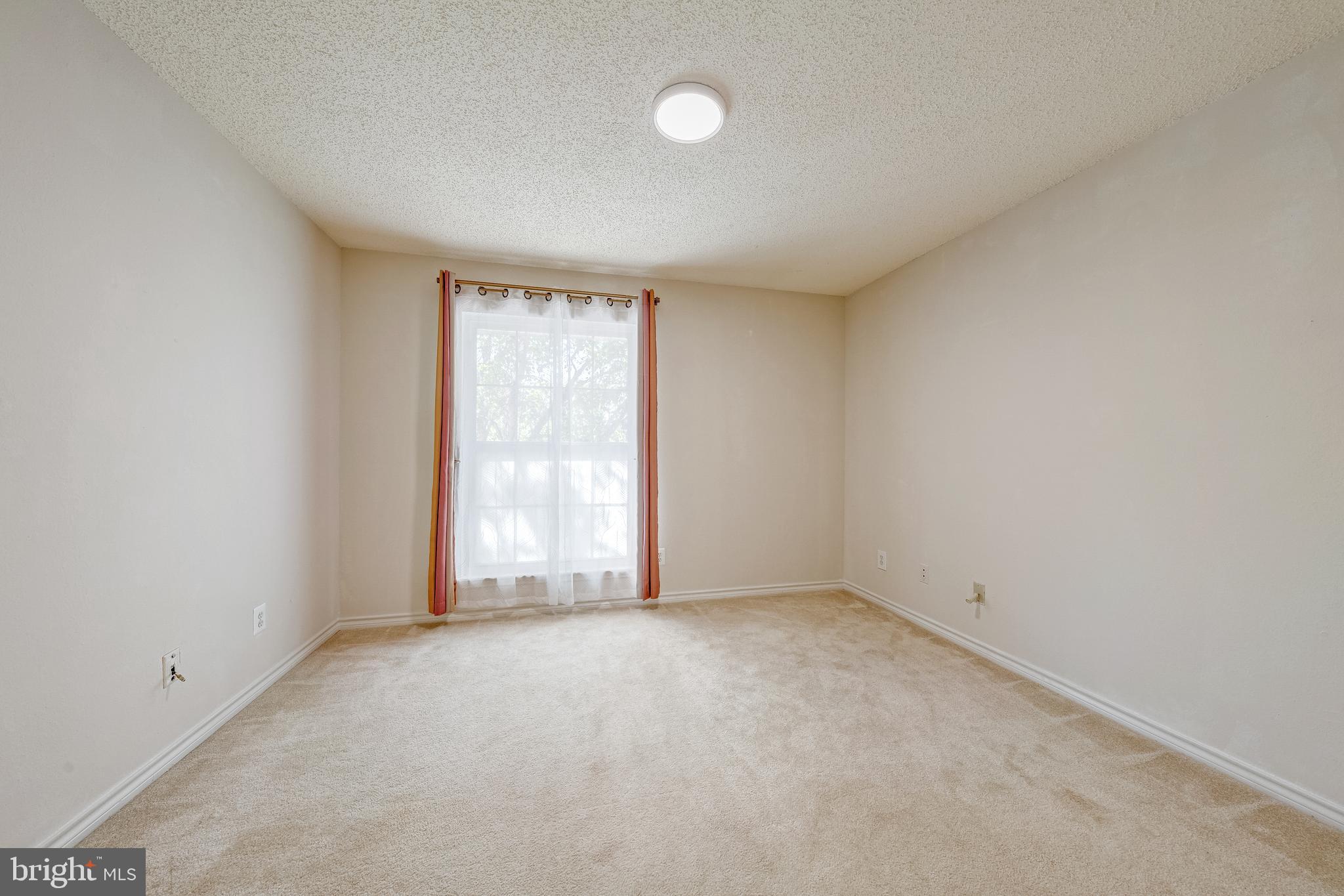 1539 Lincoln Way, Unit 302B McLean, VA 22102 - Photo 24 of 53 an empty room with windows