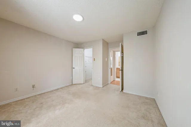 a view of small space with empty racks on the wall