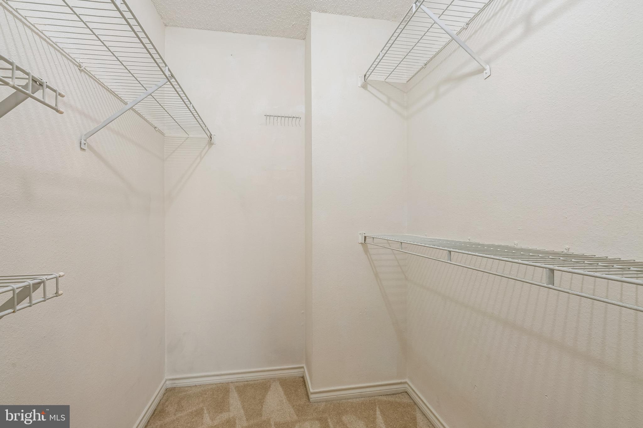 1539 Lincoln Way, Unit 302B McLean, VA 22102 - Photo 27 of 53 a view of small space with empty racks on the wall
