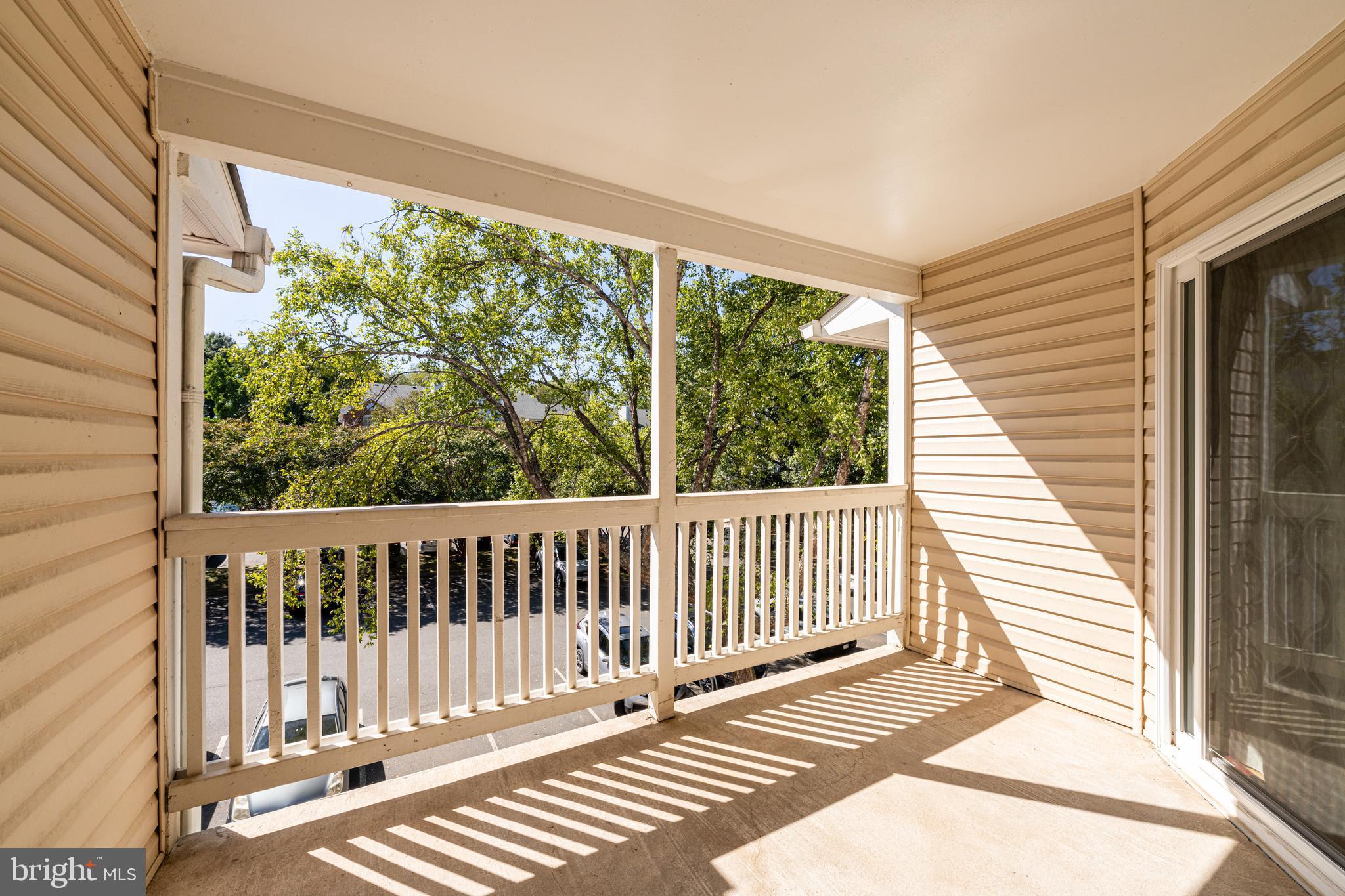 1539 Lincoln Way, Unit 302B McLean, VA 22102 - Photo 30 of 53 a view of a two chairs in the porch