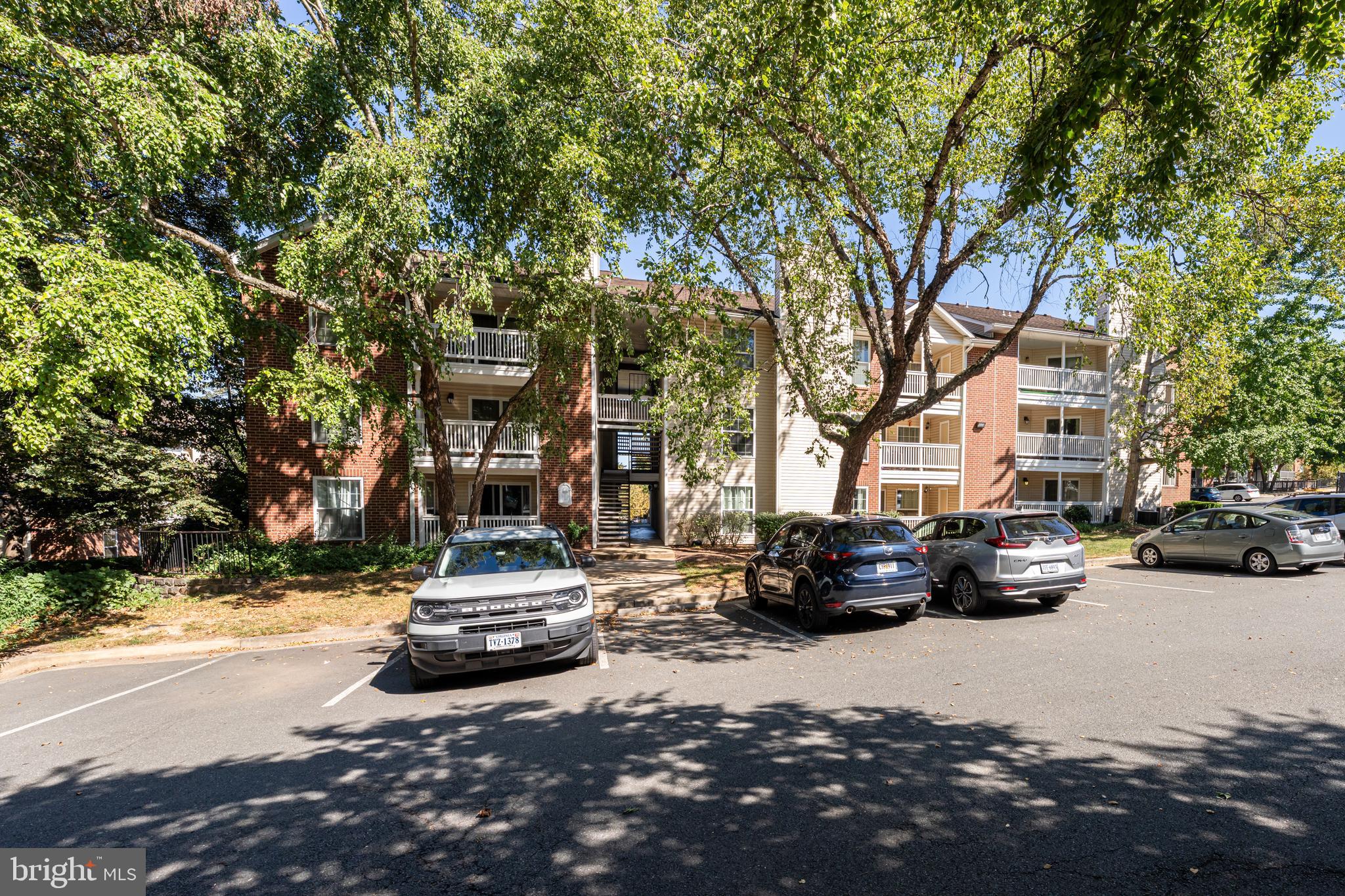 1539 Lincoln Way, Unit 302B McLean, VA 22102 - Photo 38 of 53 a car parked on the side of a street