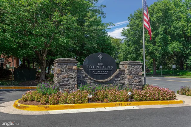 a view of a swimming pool with a sitting space