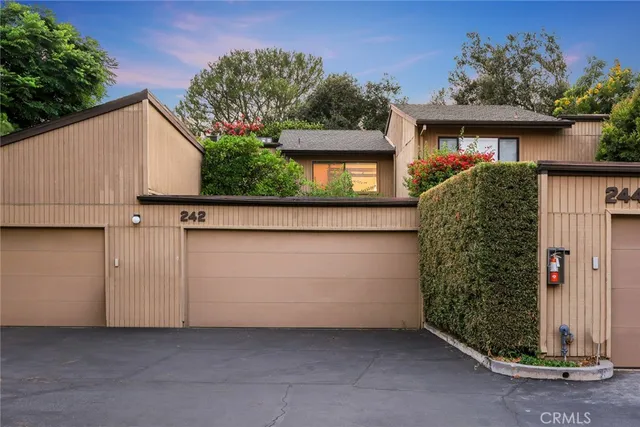 a view of a house with a garage