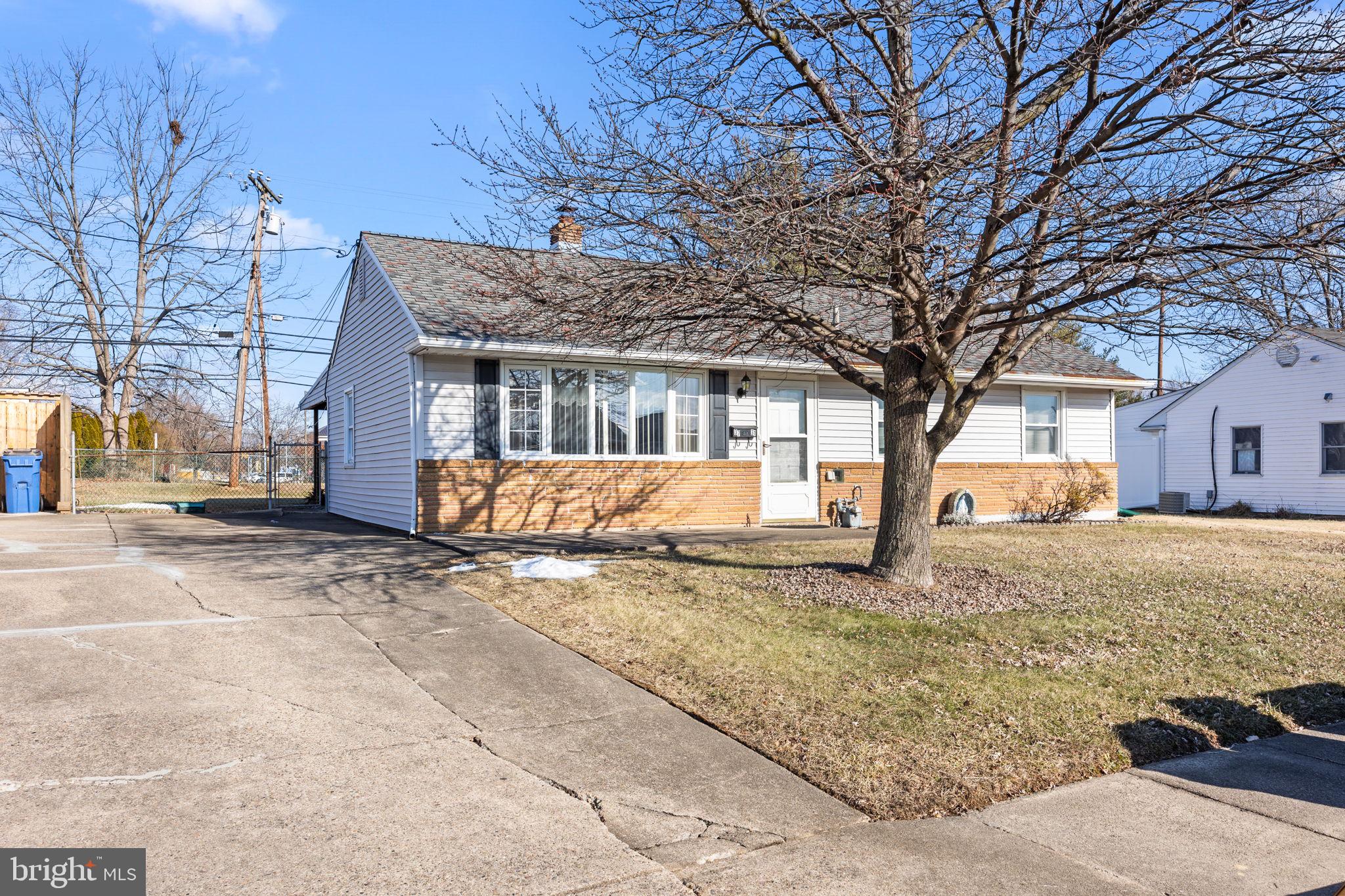 3731 Dresher Road Bensalem, PA 19020 - Photo 20 of 21 a view of a house with a yard covered in snow