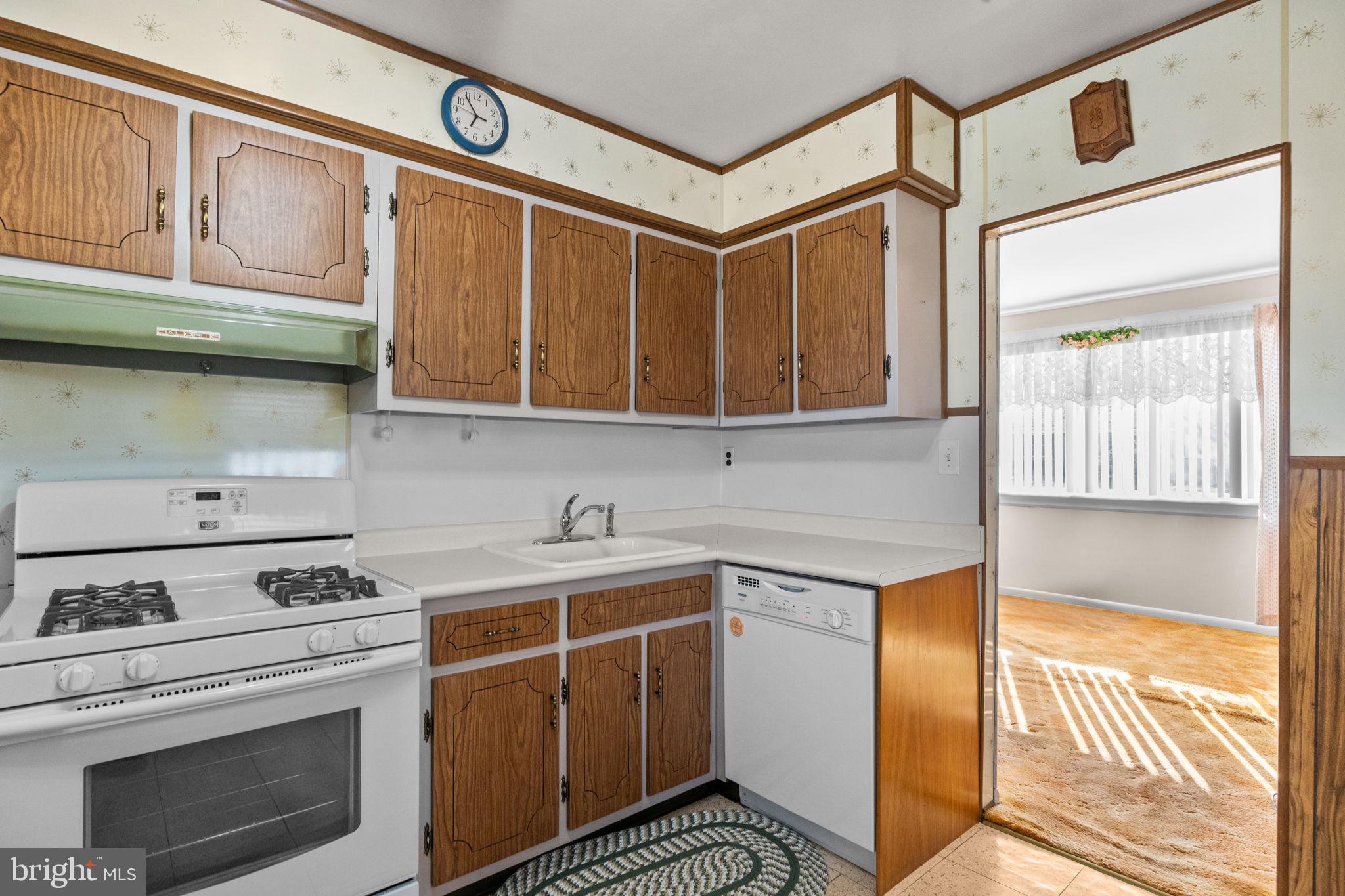 3731 Dresher Road Bensalem, PA 19020 - Photo 6 of 21 a kitchen with stainless steel appliances granite countertop a stove and a cabinets