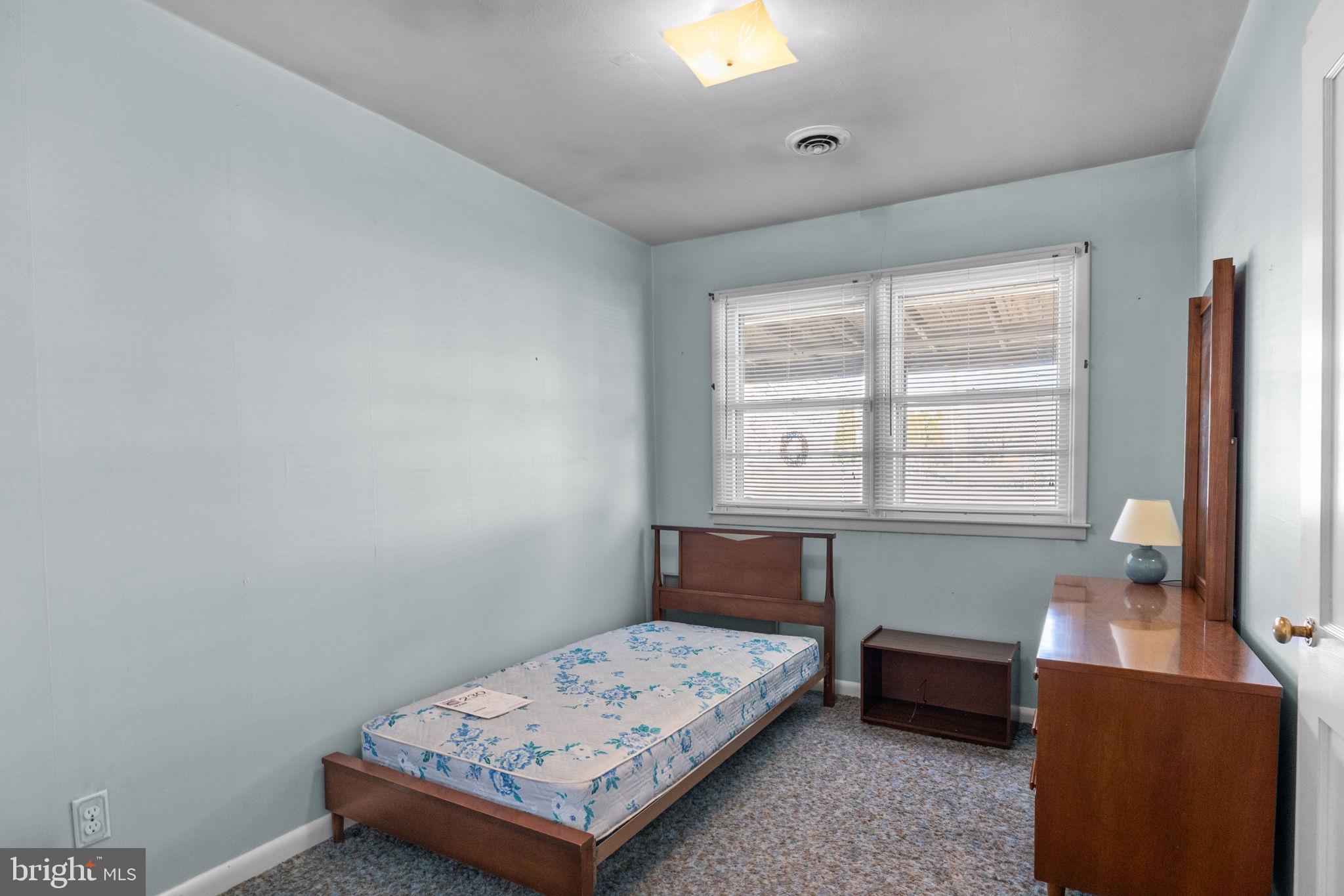 3731 Dresher Road Bensalem, PA 19020 - Photo 10 of 21 a bedroom with a bed and a window