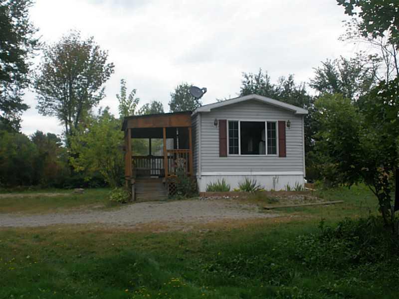 327 Howland Road Lagrange, ME 04453 - Photo 3 of 26 Exterior Front.