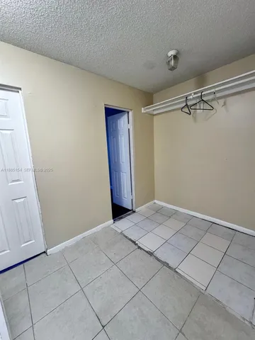 a bathroom with a sink a vanity and a mirror