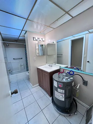 a view of a house with a yard and garage