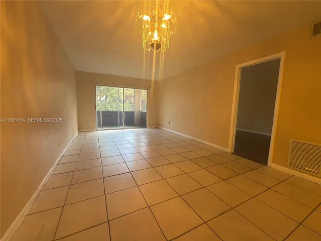 a view of a livingroom with a window