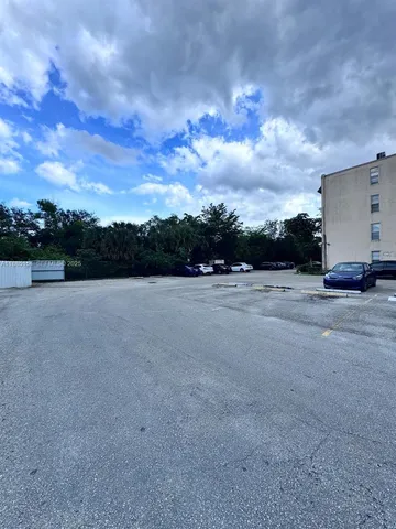 a view of livingroom with wooden floor and window