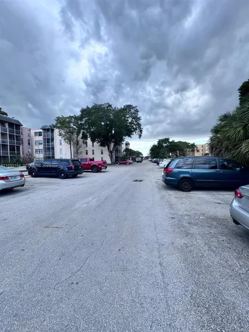 a view of a room with a large window