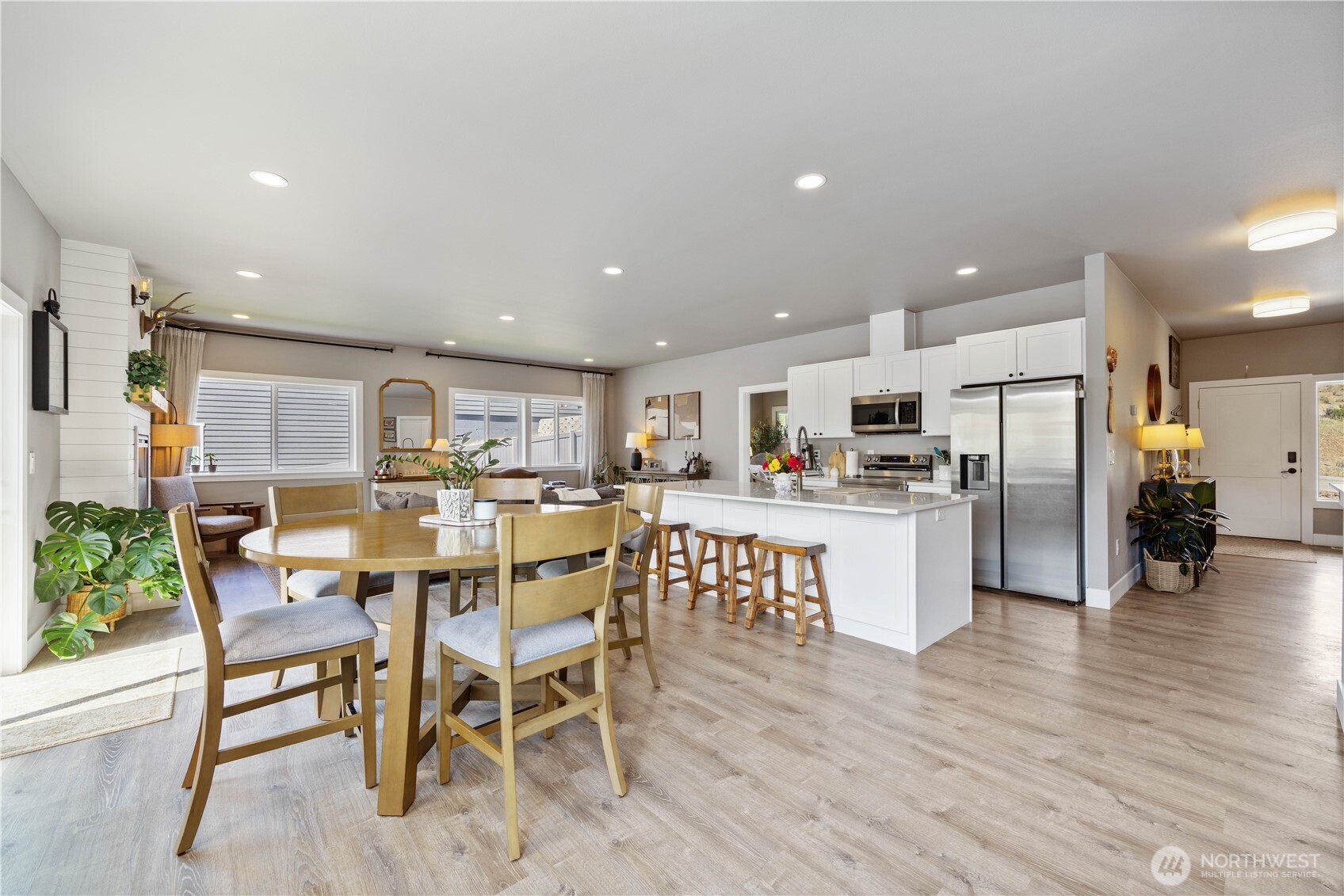 9968 Griffith Place Entiat, WA 98822 - Photo 1 of 38 a view of a dining area with furniture and wooden floor
