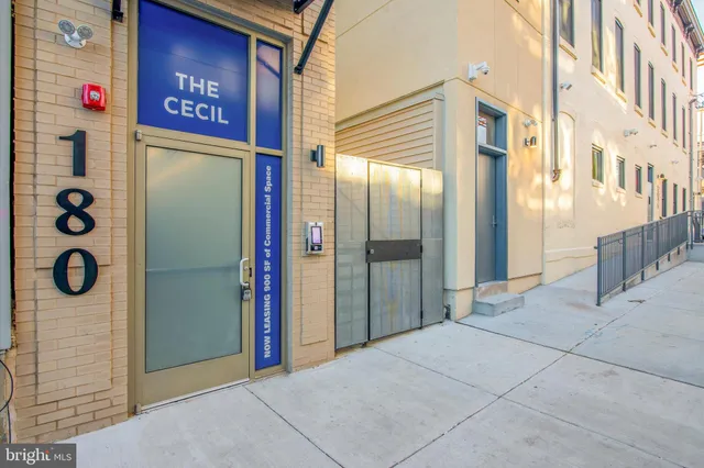 a view of a street with an entrance to other room