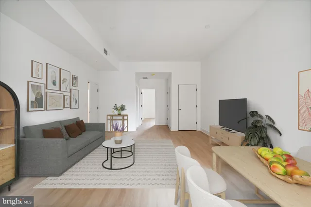 a living room with furniture and a couch