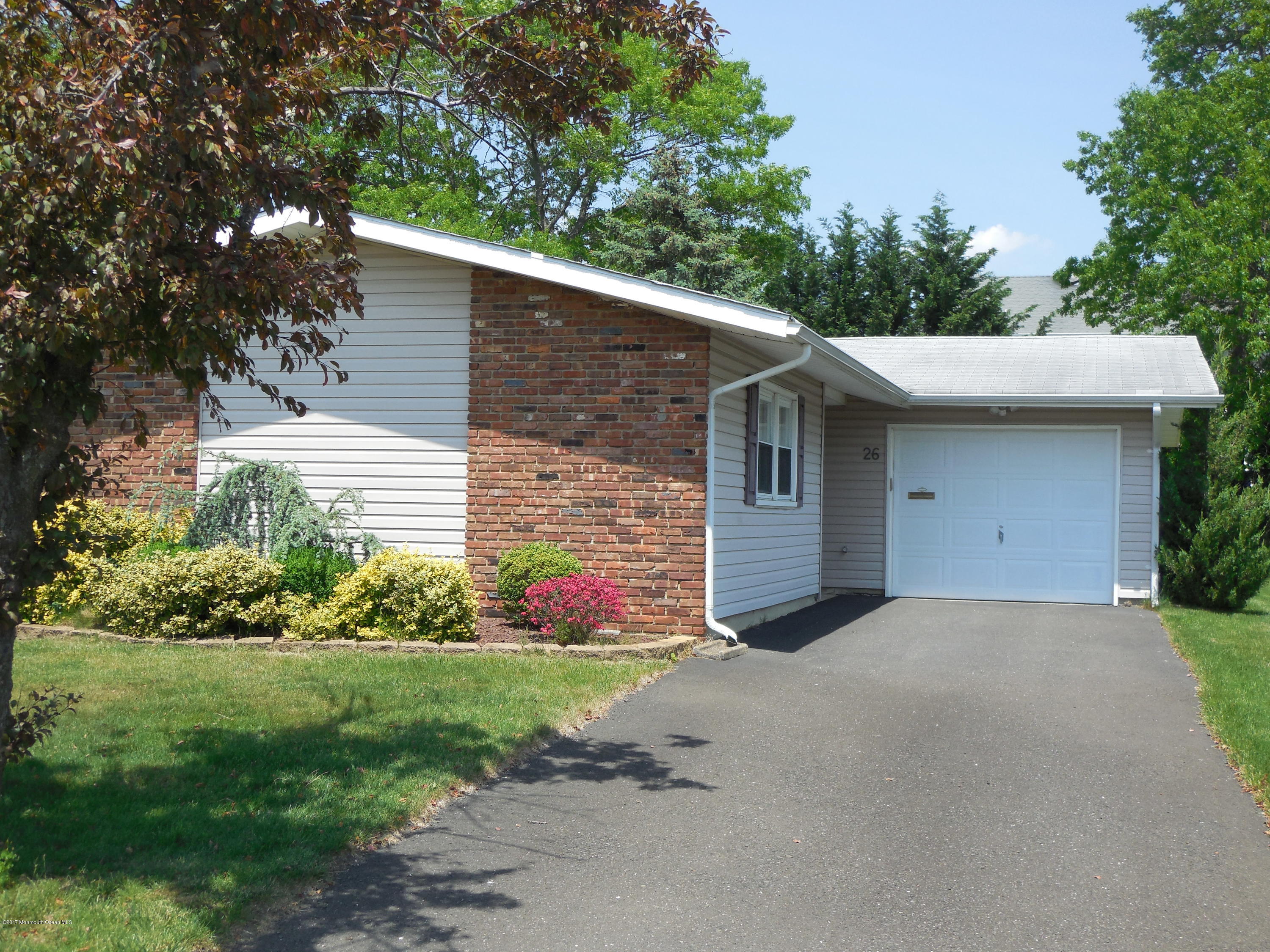 26 Phillips Road Brick, NJ 08724 - Photo 1 of 16 a view of a house with a garden