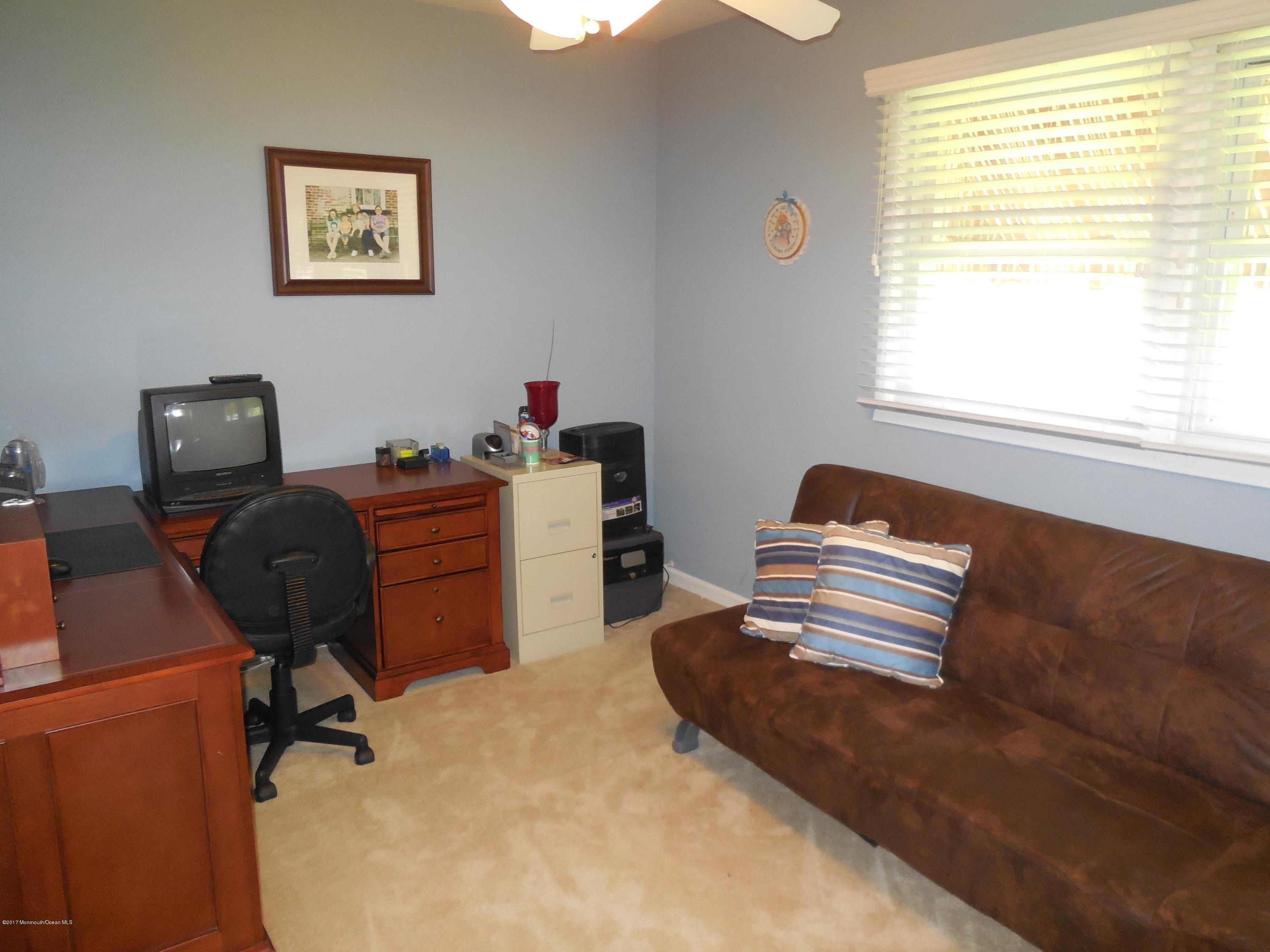 26 Phillips Road Brick, NJ 08724 - Photo 12 of 16 a view of a workspace with furniture and a window