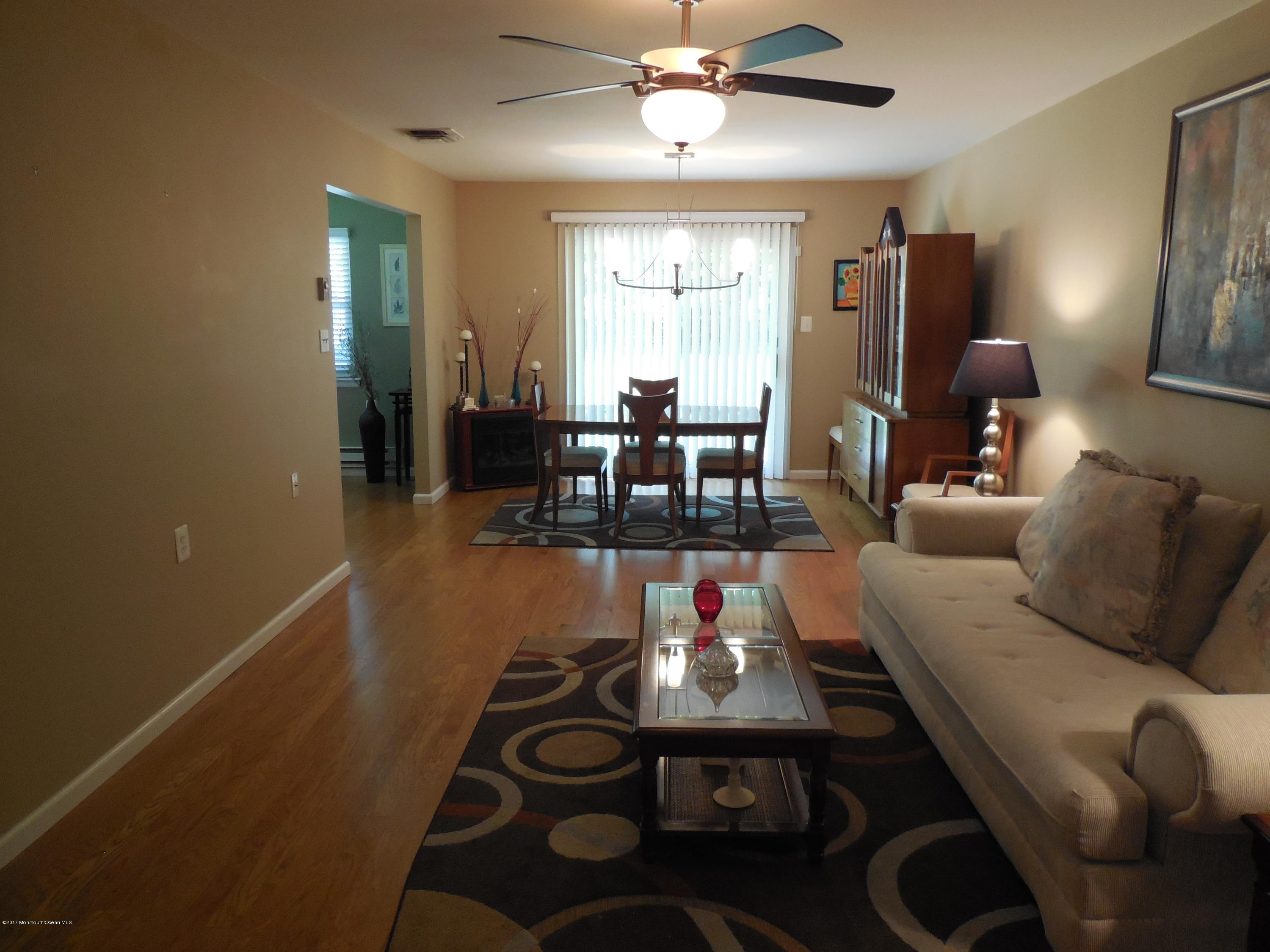 26 Phillips Road Brick, NJ 08724 - Photo 2 of 16 a living room with furniture and chandelier