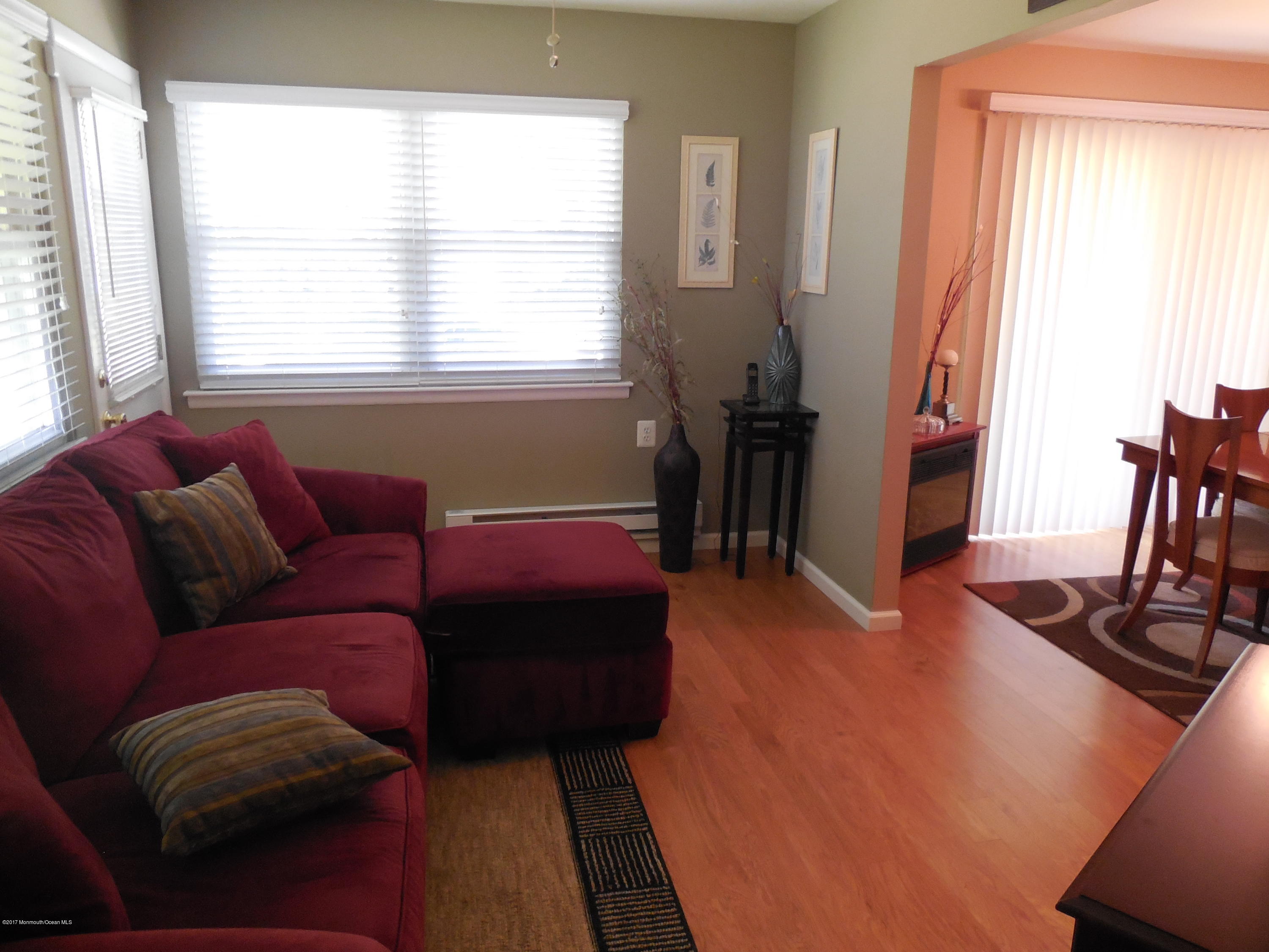 26 Phillips Road Brick, NJ 08724 - Photo 5 of 16 a living room with furniture and a window
