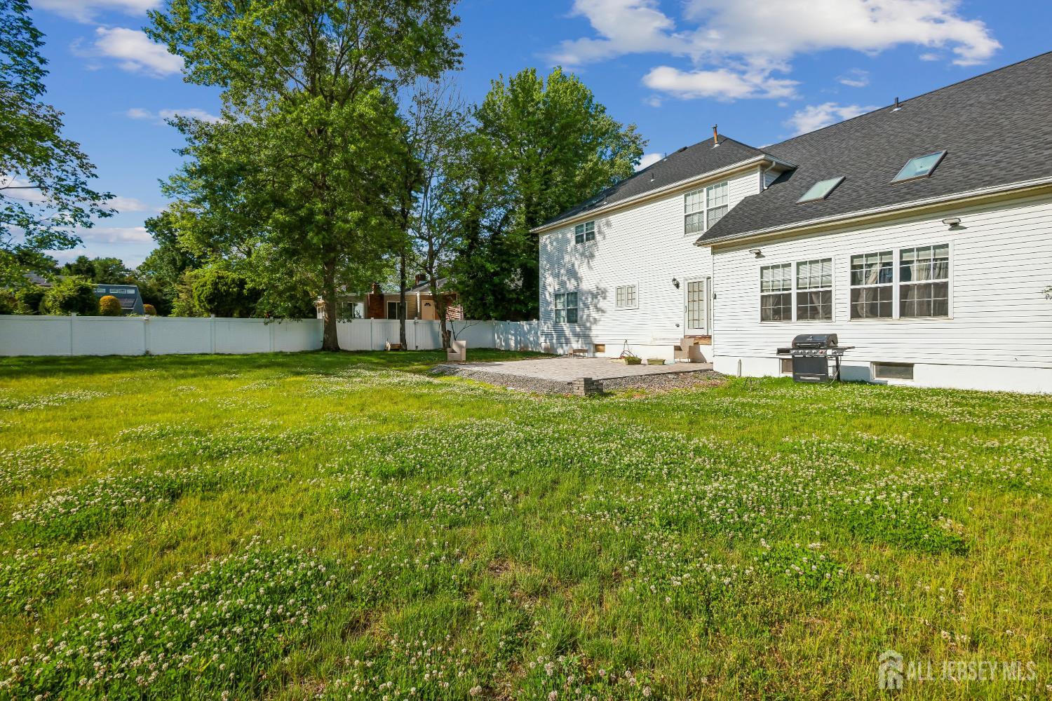 489 Plainfield Road Edison, NJ 08820 - Photo 36 of 39 a view of a house with a big yard and sitting area