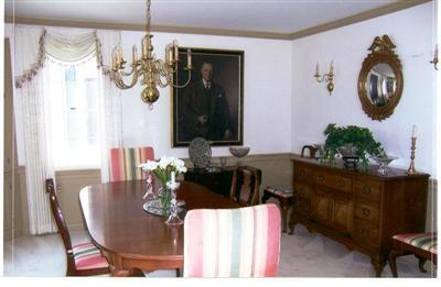 265 Bay Road Harwich, MA 02645 - Photo 8 of 11 a front view of a dining room with furniture