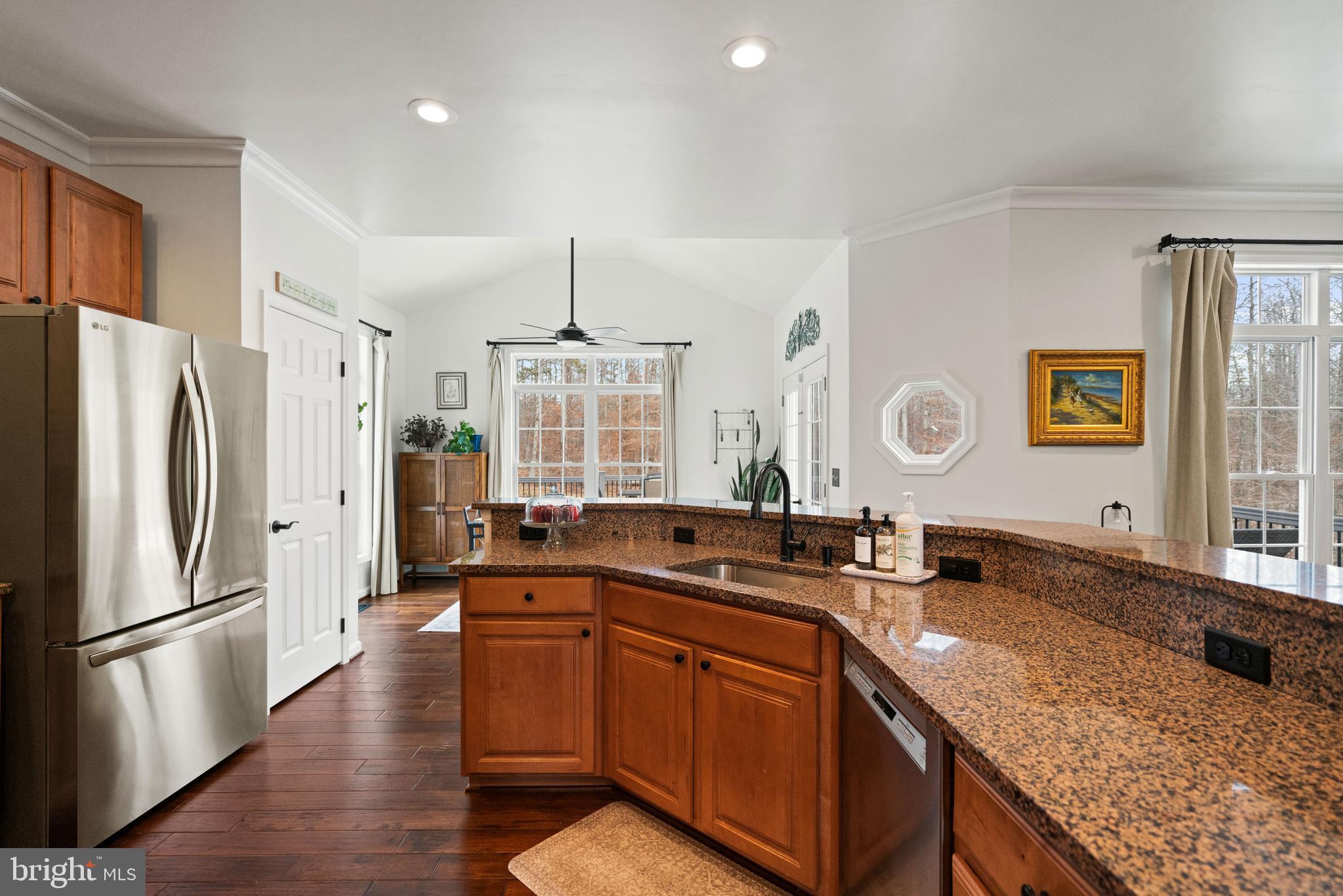 10448 Wheatley School Road Marshall, VA 20115 - Photo 11 of 43 a kitchen with stainless steel appliances granite countertop a sink stove and refrigerator