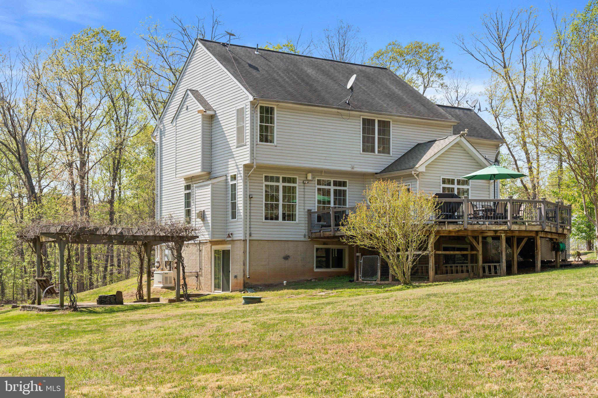 10448 Wheatley School Road Marshall, VA 20115 - Photo 36 of 48 a house view with a garden space