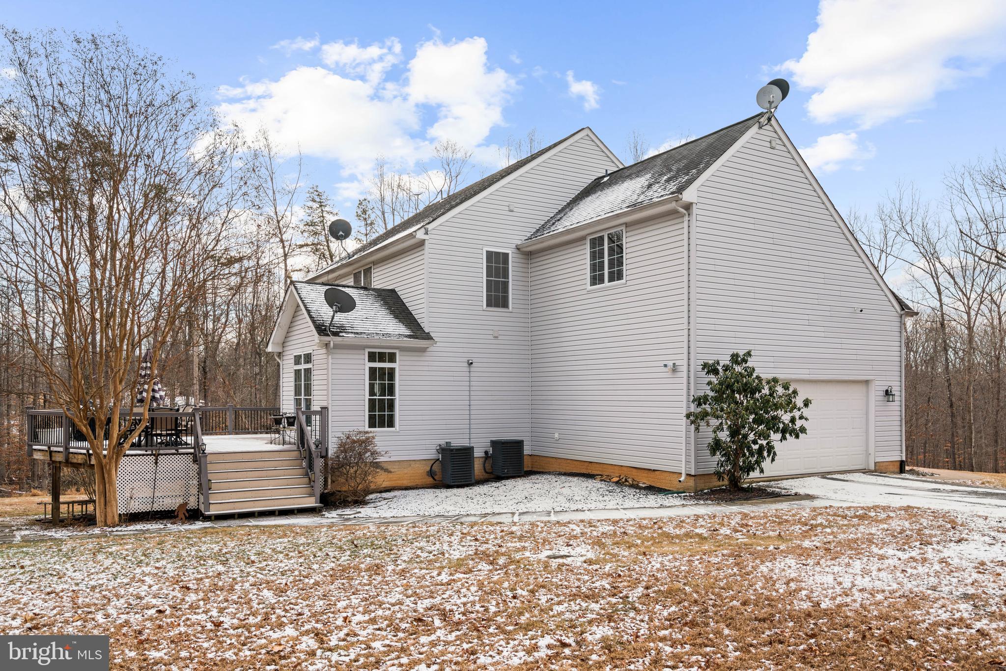10448 Wheatley School Road Marshall, VA 20115 - Photo 42 of 48 a view of a house with a snow in the yard