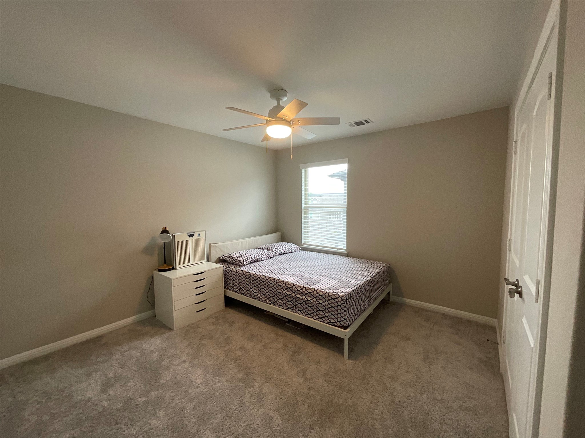 5425 Durango Pass Austin, TX 78724 - Photo 9 of 32 Bedroom with a ceiling fan