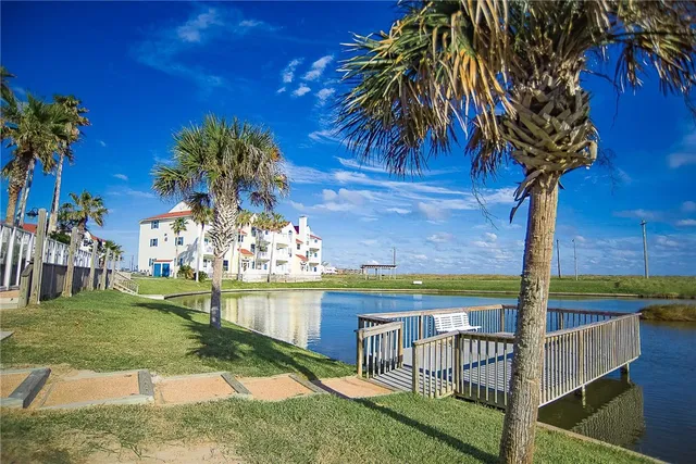 a group of people sitting in front of building