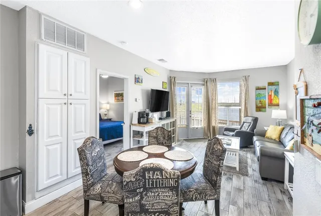 a kitchen with stainless steel appliances a refrigerator a stove and a sink