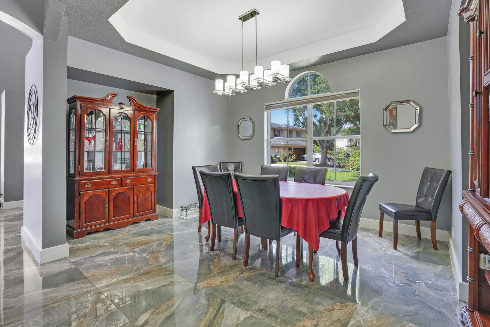 403 Mangrove Point Jupiter, FL 33458 - Photo 11 of 51 a view of a dining room with furniture window and wooden floor