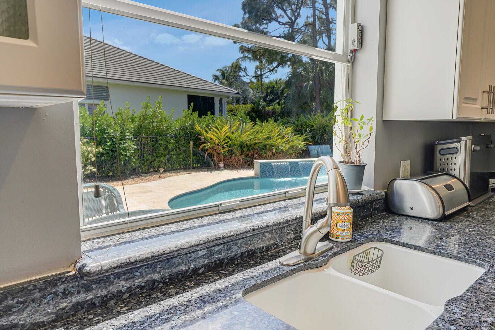 403 Mangrove Point Jupiter, FL 33458 - Photo 14 of 51 a view of a two chairs in the patio