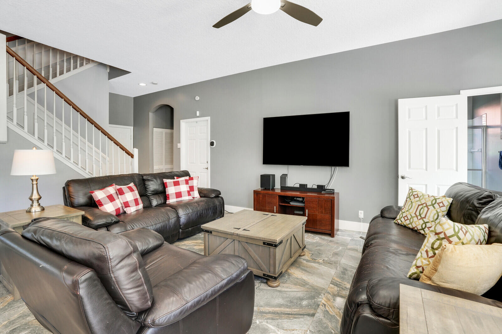 403 Mangrove Point Jupiter, FL 33458 - Photo 15 of 51 a living room with furniture and a flat screen tv