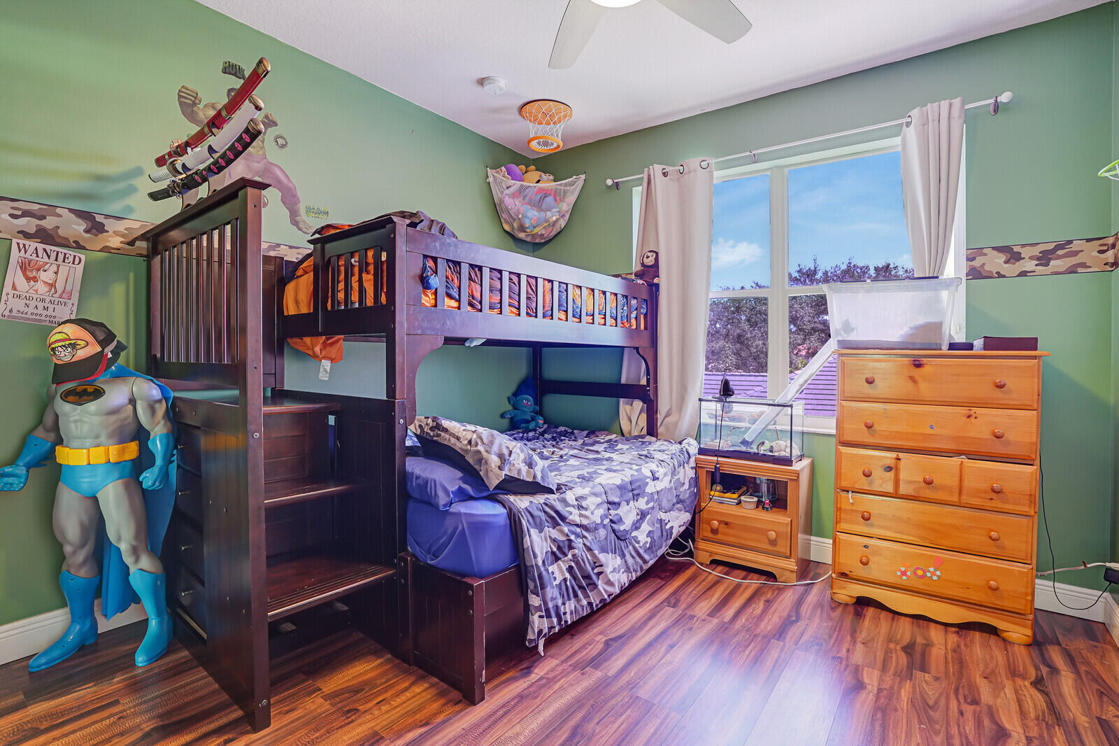 403 Mangrove Point Jupiter, FL 33458 - Photo 30 of 51 a bedroom with furniture and a wooden floor