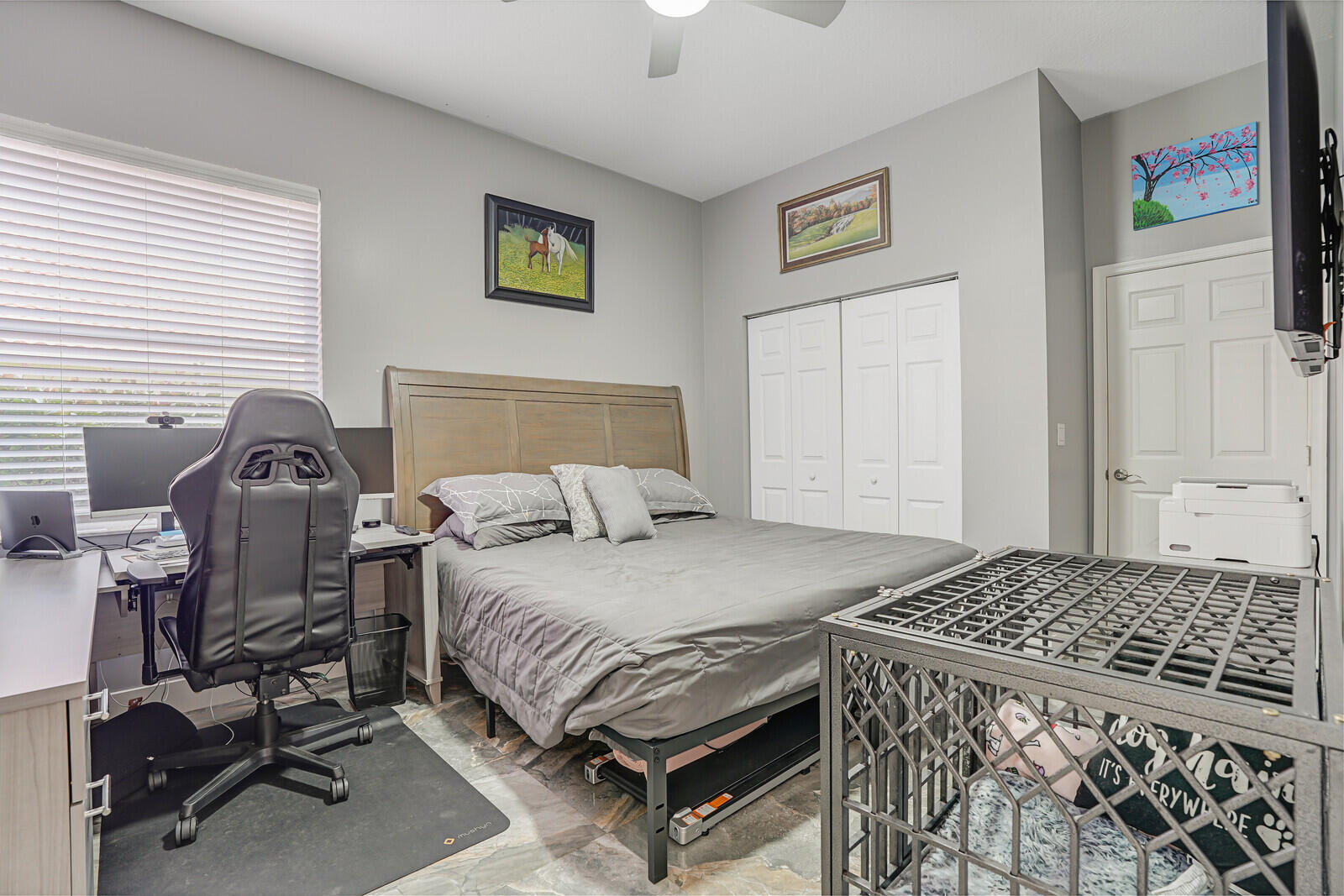 403 Mangrove Point Jupiter, FL 33458 - Photo 33 of 51 a bedroom with a bed and a table in it