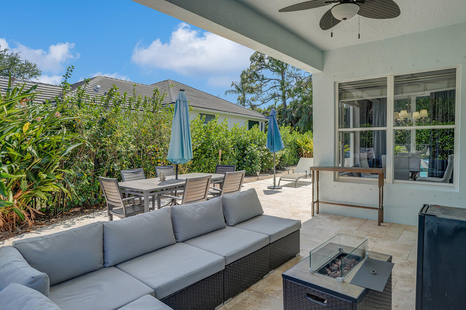 403 Mangrove Point Jupiter, FL 33458 - Photo 35 of 51 a living room with furniture and a large window
