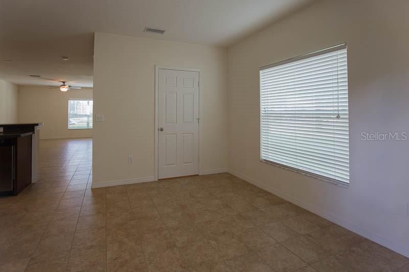 15810 Fishhawk View Drive Lithia, FL 33547 - Photo 10 of 34 a view of an empty room with a window