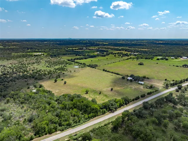 a view of a lake from a yard