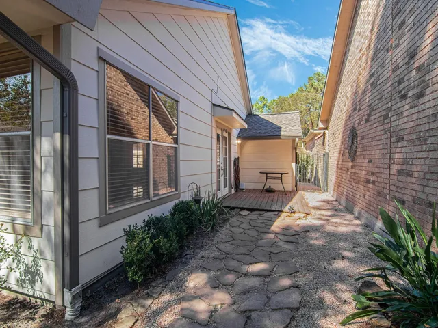 a view of a back yard of the house