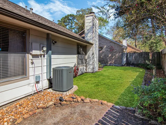 a view of a backyard with a tub
