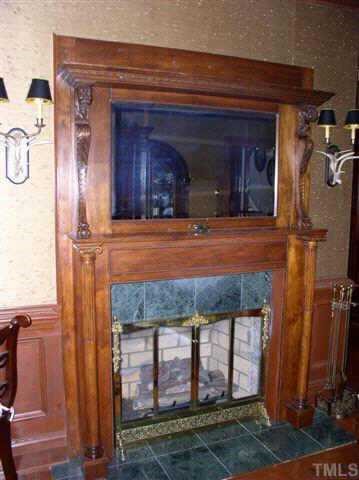 905 Pearces Road Zebulon, NC 27597 - Photo 2 of 11 Fireplace in Den