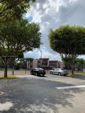 a car parked in front of a building