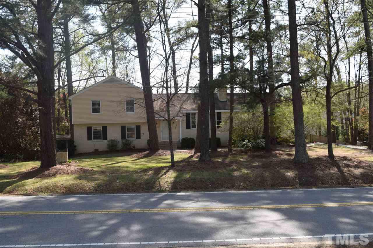 1513 Creech Road Garner, NC 27529 - Photo 1 of 10 a view of a house with a yard